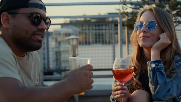 Young couple spending time together at the roof top. Shot with RED helium camera in 8K.