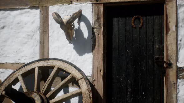 Old Wood Wheel and Black Door at White House