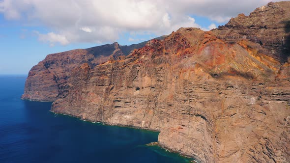 Drone Flight Over Peaks of High Rock Los Gigantes in Tenerife Island