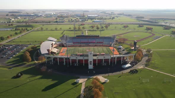Bowling Green State University Doyt L. Perry football stadium side shot zoom in drone video.