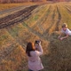 The Girl Makes the Photo and Video of Teen Lain on the Haystack - VideoHive Item for Sale