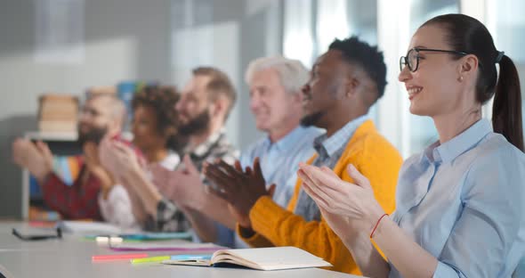 Multiethnic People Clapping Hands After Business Seminar