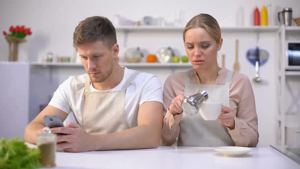 Jealous Woman Peeping in Husbands Smartphone, Relationship Crisis, Distrust