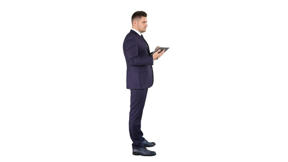 Young Businessman Touching Digital Tablet and Checking