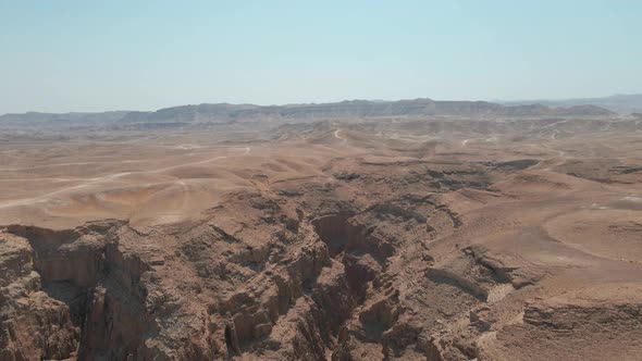 Flying Above The Desert Mountains