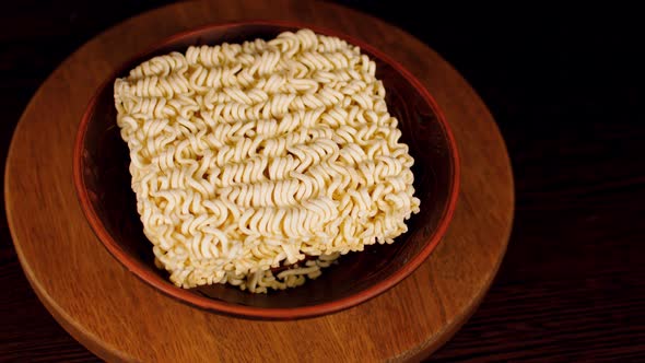 Instant Noodles are Poured with Boiling Water