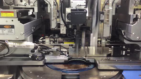 Pick up silicon die wafer in semiconductor manufacturing, Motion video of pickup silicon wafer.