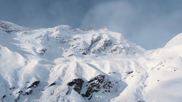 Snow Sublimation Into Vapor on Boundless High Mountains