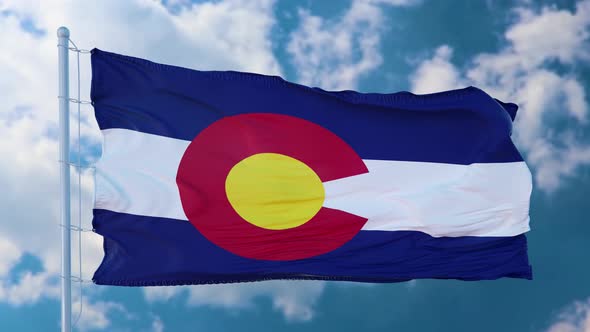 Flag of Colorado State Region of the United States Waving at Wind