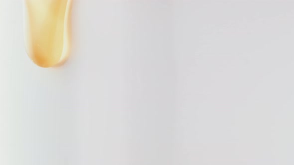 Thick honey dripping. Slow Motion. alt