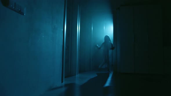 Ghost Girl In White Nightgown With Loose Hair In A Scary House