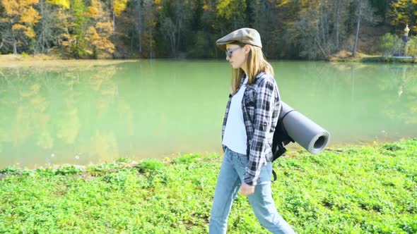 Girl on a Hike in the Mountains. Slow Motion Video