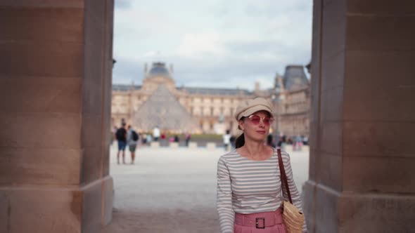 Young girl entering an arch in France