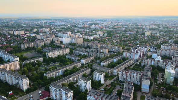 Aerial View of High Rise Apartment Buildings Private Houses and Streets in City Residential Area in