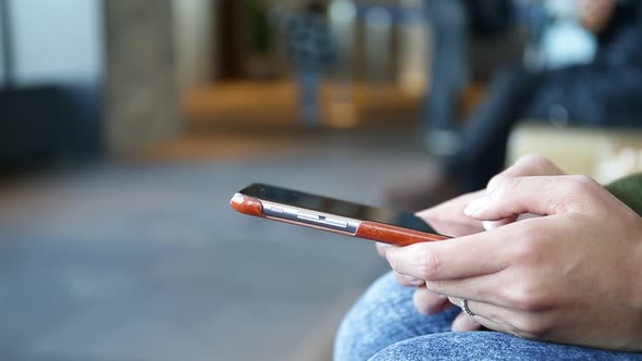 Woman using cell phone at outdoor