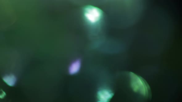 Multicolored Light Leaks  Footage on Black Background. Stylizing Video, Transitions. Bokeh Effect