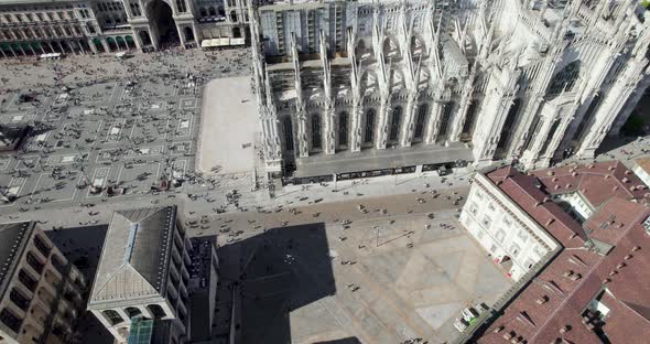 Duomo Cathedral and Piazza Duomo in Milan, Italy, Aerial Drone View, Tilt Up