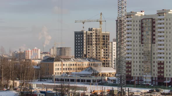 Tower Cranes Working on Construction Site Residential Housing Estate Building Constructors