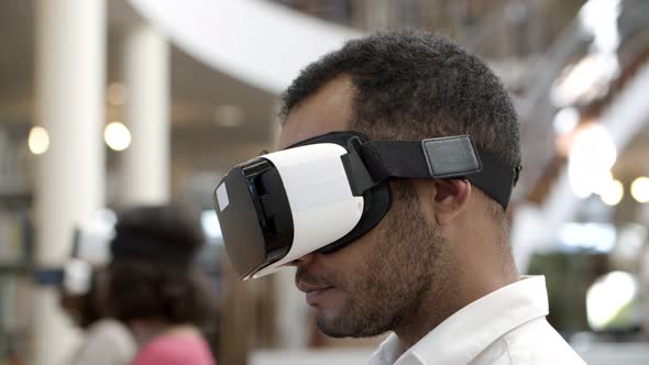 Cheerful African American User Wearing VR Glasses