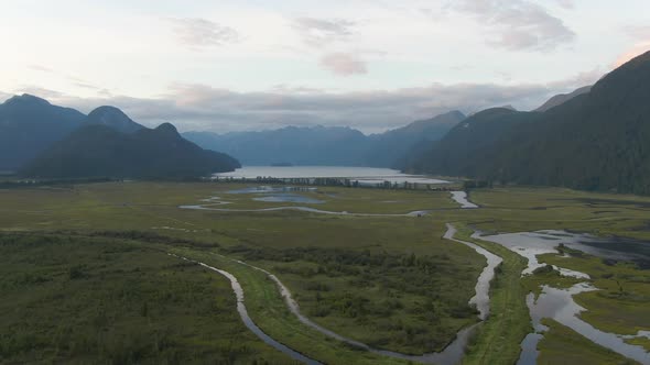 Beautiful Aerial Panoramic View of Canadian Mountain Landscape during a vibrant summer sunset. Taken