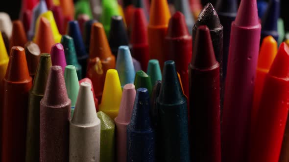 Rotating shot of color wax crayons for drawing and crafts - CRAYONS 003