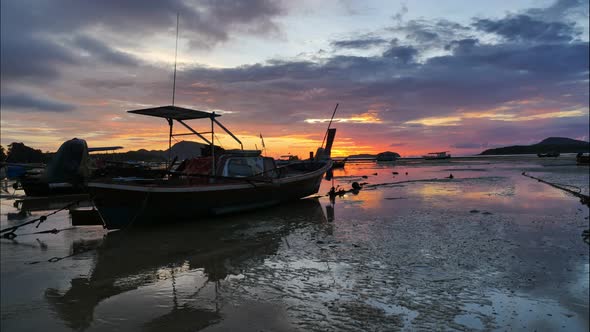 Time Lapsestunning Sunrise Over Fishing Boat.