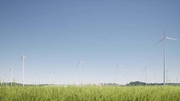 Wind Generators Farm Grass on Clear Blue Sky