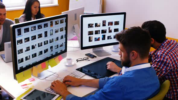 Graphic designers working at their desk