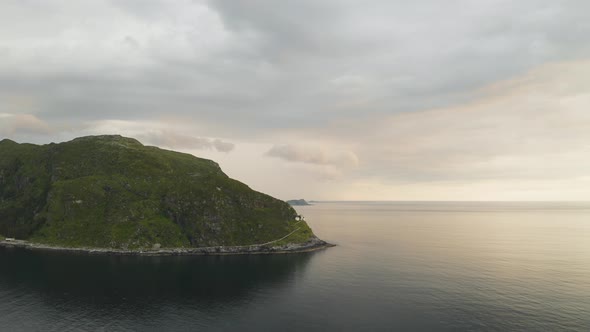 Hendanes Lighthouse At The Vagsoy Island In Kinn Municipality In Vestland County, Norway. aerial