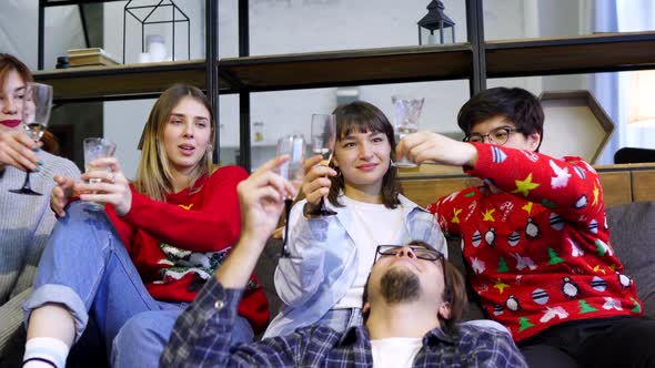 Group Friends Talking Sitting in a Couch in the Living Room