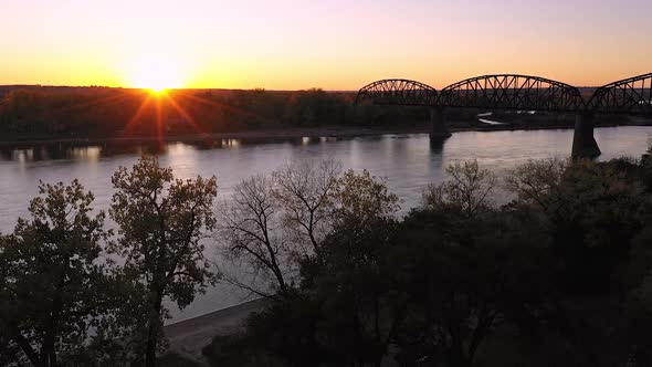 Flying towards the sun setting over North Dakota along the Missouri River