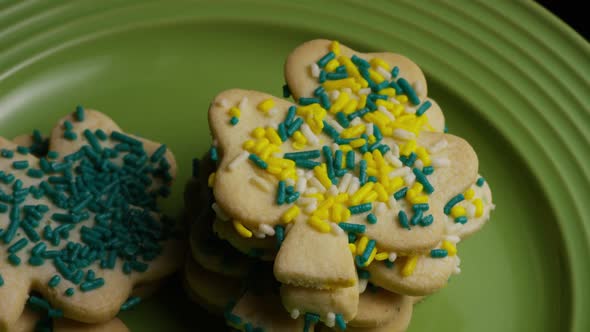 Cinematic, Rotating Shot of Saint Patty's Day Cookies on a Plate 