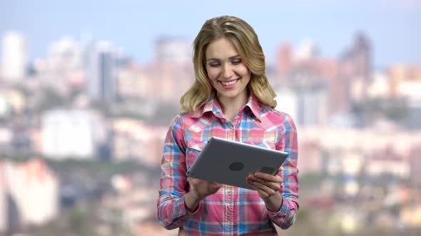 Woman Speaker Using Digital Tablet