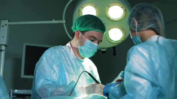Two of Surgeons at the Work