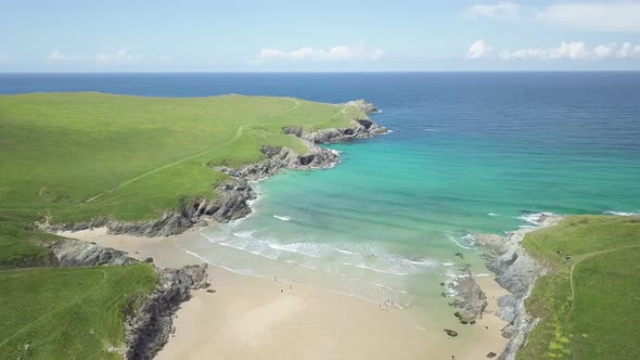 Picturesque Landscape Of Calm Blue Sea, Kelsey Head, West Pentire Peninsula From Poly Joke Beach In