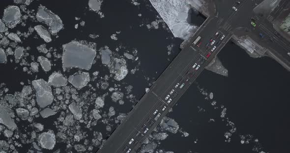 Ice Drift in River And Bridge Crossing It