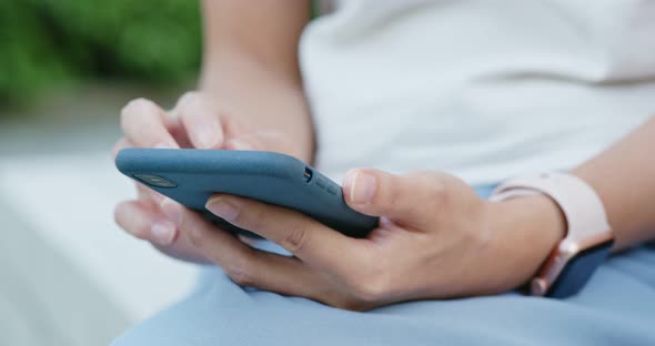 Woman use of mobile phone