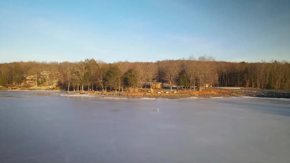 a lake community in the pocono mountains during winter.