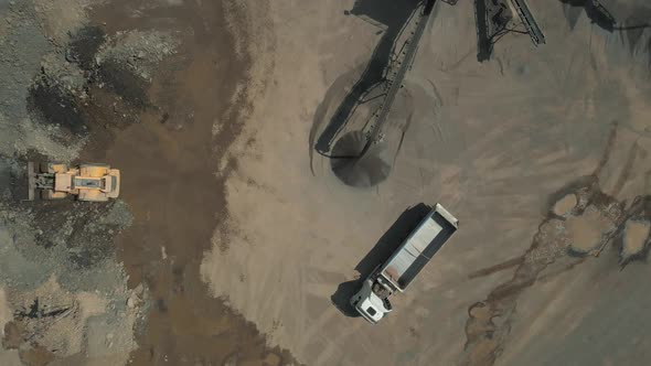 Heavy Machinery Working in a Stone Quarry