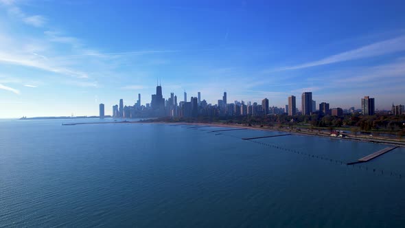 Chicago City Skyline Under Bright Blue Sky Drone Footage