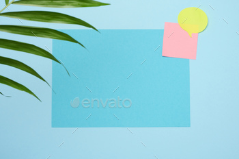 Blank rectangular sheet of paper on a blue background