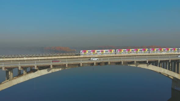 Subway Train Ride Over Bridge Crossing River