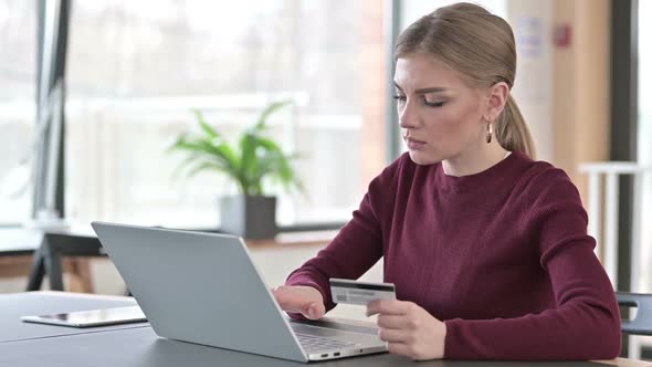 Unsuccessful Online Payment on Laptop By Young Woman