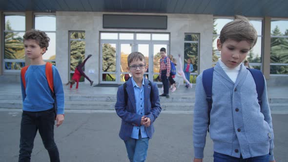 Joyful Elementary Age Boys Going From School