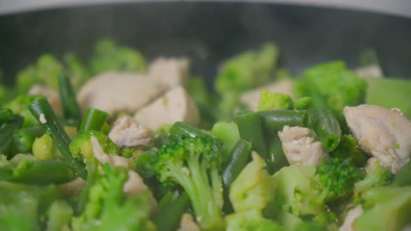 Fried Chicken Fillet with Mixed Fried Vegetables in a Pan for Serving