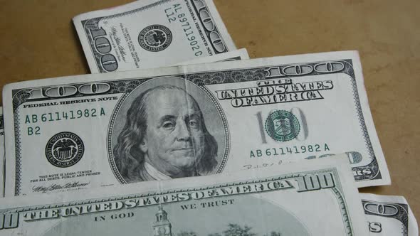 Rotating stock footage shot of $100 bills - MONEY 0148