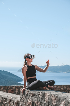 Traveler in virtual reality headset augmented with virtual reality in the concept of a beautiful mou