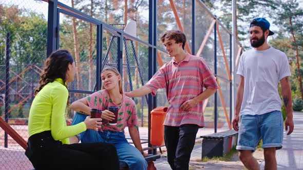 In a Urban Skate Park Two Young Men Meeting Some