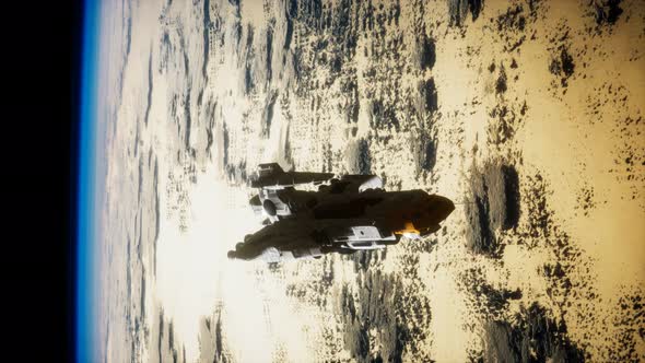 Futuristic Spaceship Near the Earth. Elements of This Image Furnished By NASA alt