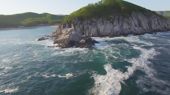 View From a Droneon a Stone Cape Washed By Strong Waves